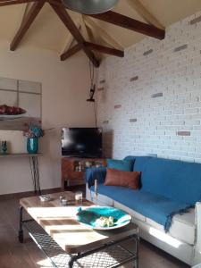 TV a/nebo společenská místnost v ubytování Maro's Guesthouse