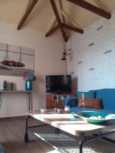 TV a/nebo společenská místnost v ubytování Maro's Guesthouse