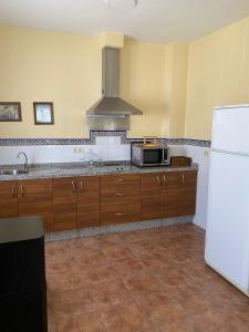 Casa Rural Francisco Pizarro tesisinde mutfak veya mini mutfak