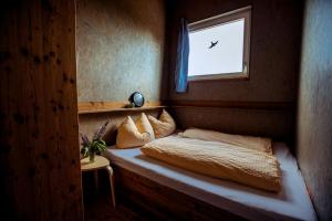 A bed or beds in a room at Chalet Hebalm