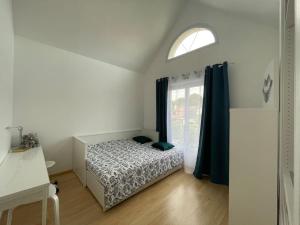 Fotografia z galérie ubytovania Proche Paris et Disney Maison 90 M2 CLIMATISÉ bord de Marne v destinácii Gournay-sur-Marne