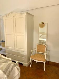 A bed or beds in a room at TENUTA MONTANARO