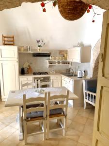 A kitchen or kitchenette at TENUTA MONTANARO