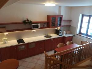 Kuchyň nebo kuchyňský kout v ubytování apartmány Zak