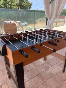 Stolní tenis v ubytování Holiday Home Calma nebo okolí