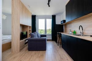 Posteľ alebo postele v izbe v ubytovaní ShortStayPoland Pileckiego