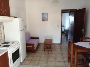 Kuchyňa alebo kuchynka v ubytovaní Oasis Apartments