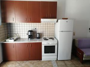 Kuchyňa alebo kuchynka v ubytovaní Oasis Apartments