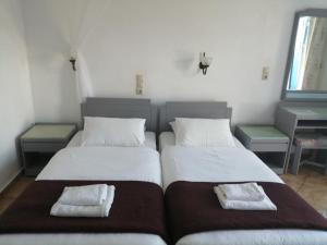 Posteľ alebo postele v izbe v ubytovaní Oasis Apartments