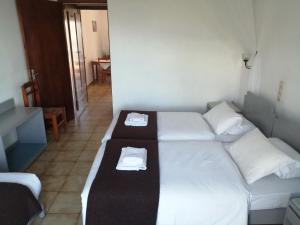 Posteľ alebo postele v izbe v ubytovaní Oasis Apartments