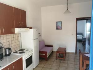 Kuchyňa alebo kuchynka v ubytovaní Oasis Apartments