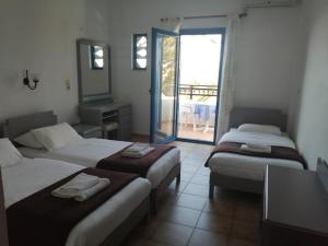 Posteľ alebo postele v izbe v ubytovaní Oasis Apartments
