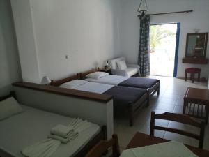 Posteľ alebo postele v izbe v ubytovaní Oasis Apartments