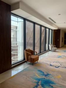 Χώρος καθιστικού στο Rosa Grand Hotel