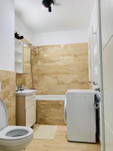 Ένα μπάνιο στο Newton luxury apartment