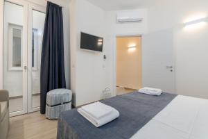 Posteľ alebo postele v izbe v ubytovaní Vie del porto
