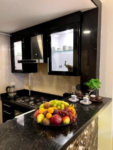 Cucina o angolo cottura di Luxury hotel apartment with pools in front AUC