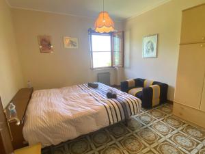 Postel nebo postele na pokoji v ubytování B&B Rox e Claudia
