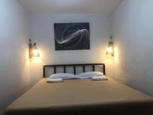 Voodi või voodid majutusasutuse Mylene Room Rental toas