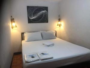 Voodi või voodid majutusasutuse Mylene Room Rental toas
