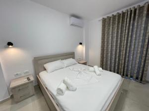 Cama o camas de una habitación en Villa Egli Ksamil