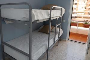 Łóżko lub łóżka w pokoju w obiekcie CHALET VILLA Los HIPOCAMPOS