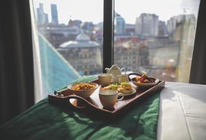 a tray of food on a table at Hotel Indigo Manchester - Victoria Station, an IHG Hotel in Manchester
