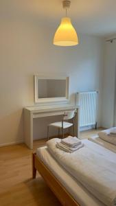 Kép Modern Flat incl Parking, near Metro U1 szállásáról Bécsben a galériában
