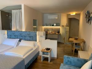 Postel nebo postele na pokoji v ubytování Albergo Ristorante Montebaldo