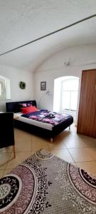 Postel nebo postele na pokoji v ubytování Schmiti FeWo