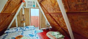 Postel nebo postele na pokoji v ubytování RC Hutspot Tourist Inn