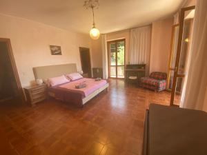 Postel nebo postele na pokoji v ubytování B&B Rox e Claudia