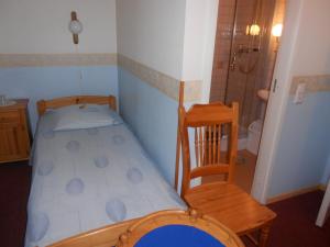 Postel nebo postele na pokoji v ubytování Poska Villa Guesthouse