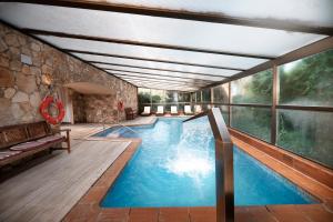 Bazén v ubytovaní Rigat Park & Spa Hotel - Adults Recommended alebo v jeho blízkosti + 37 fotografií