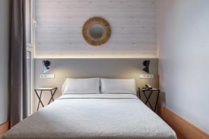 Posteľ alebo postele v izbe v ubytovaní Hotel Berri Versalles