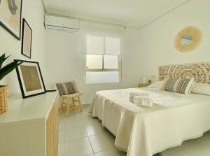 Postel nebo postele na pokoji v ubytování 168 Bahia de Denia - Deniasol + 34 fotografií