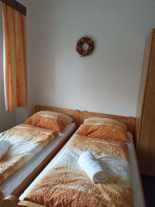 Postel nebo postele na pokoji v ubytování Statek Straňovice Apartmán 2 velký