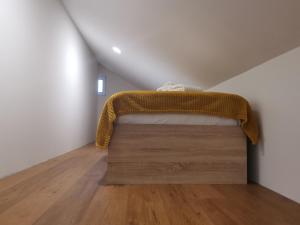 Ein Bett oder Betten in einem Zimmer der Unterkunft Nibela Apartments