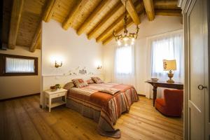 A bed or beds in a room at Agriturismo Le Volpi