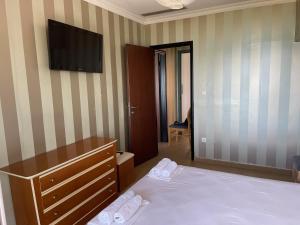 Postel nebo postele na pokoji v ubytování Plaza Hotel