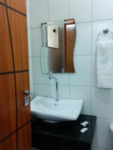 Koupelna v ubytování Conquista Palace Hotel