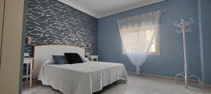 Łóżko lub łóżka w pokoju w obiekcie CHALET VILLA Los HIPOCAMPOS