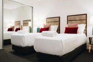 Gulta vai gultas numurā naktsmītnē Resort Style 3 Bed 2 Bath, 200m from Beach
