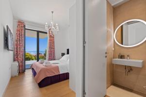 Postel nebo postele na pokoji v ubytování Apartments Villa Zara