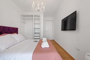 Postel nebo postele na pokoji v ubytování Apartments Villa Zara