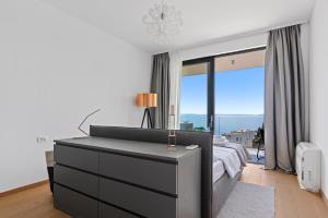 Postel nebo postele na pokoji v ubytování Apartments Villa Zara