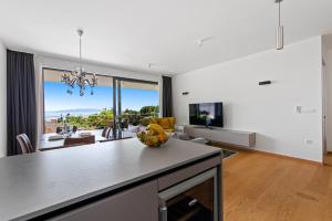 TV a/nebo společenská místnost v ubytování Apartments Villa Zara