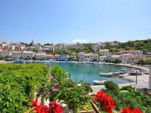 a view of a harbor with boats in the water at Villa Povlja in Povlja