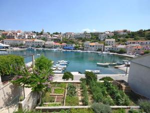 a view of a harbor with boats in the water at Villa Povlja in Povlja +12 photos