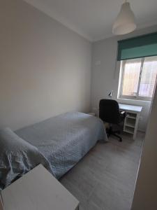 A bed or beds in a room at Precioso piso 3 dormitorios, aire acondicionado Jerez de la Frontera